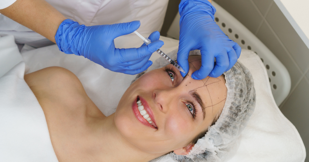 image of someone getting Botox smiling