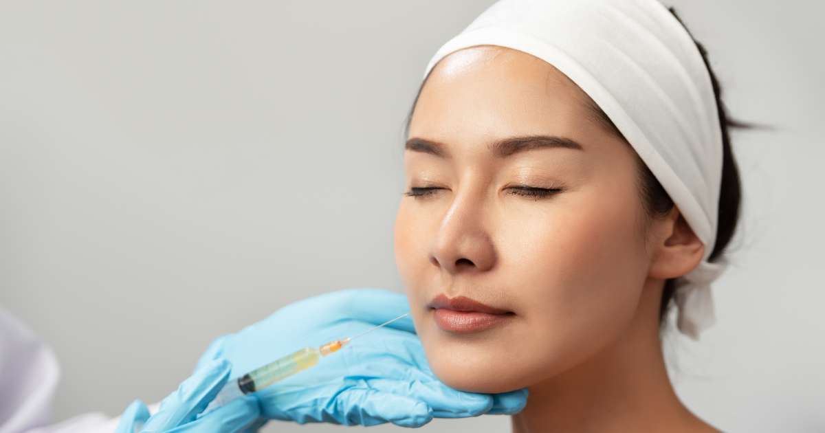 A woman undergoing lip fillers, a service offered at Calista Skin and Laser Center in Colleyville, TX.